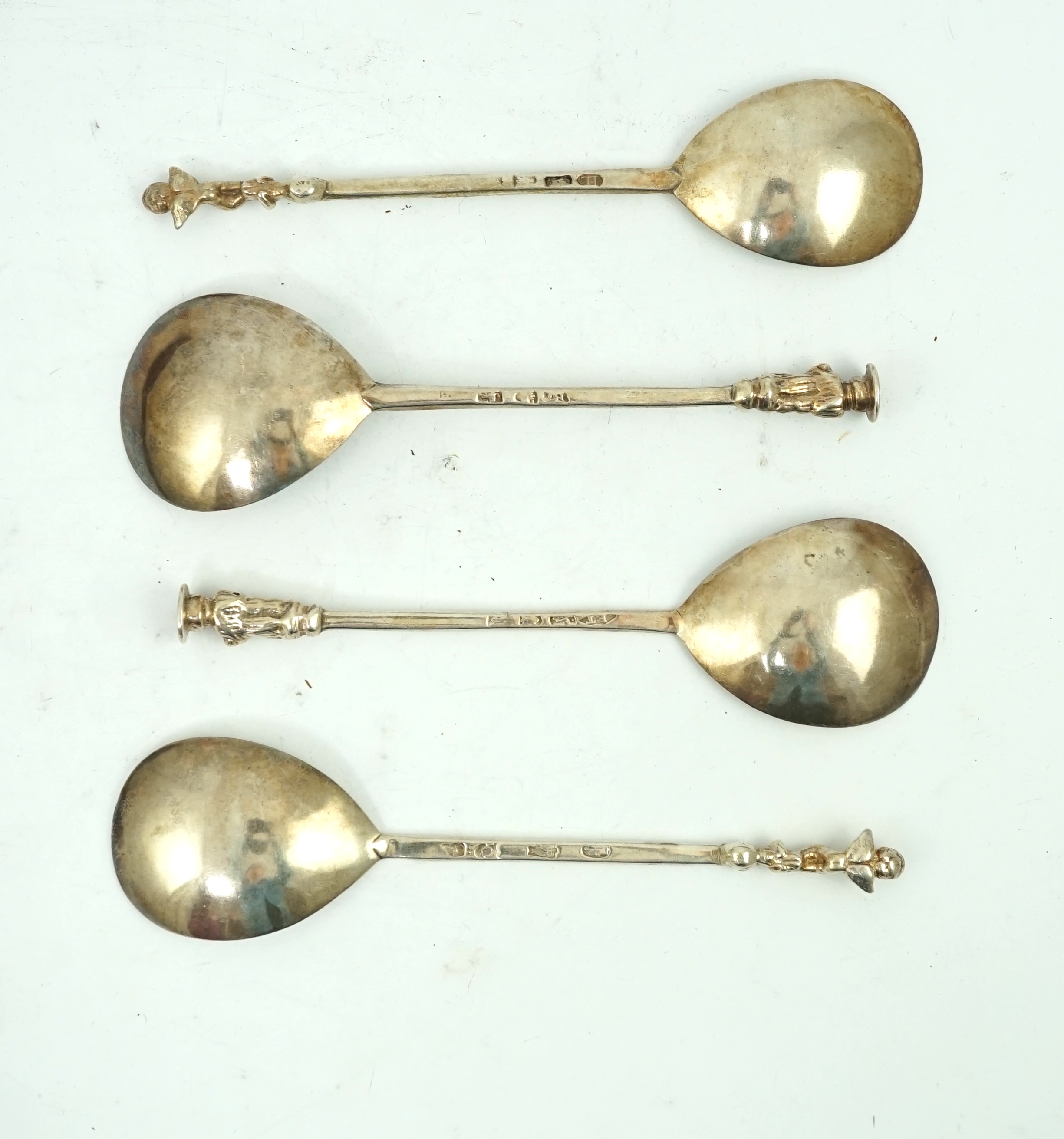 Four cased 18th century silver spoons